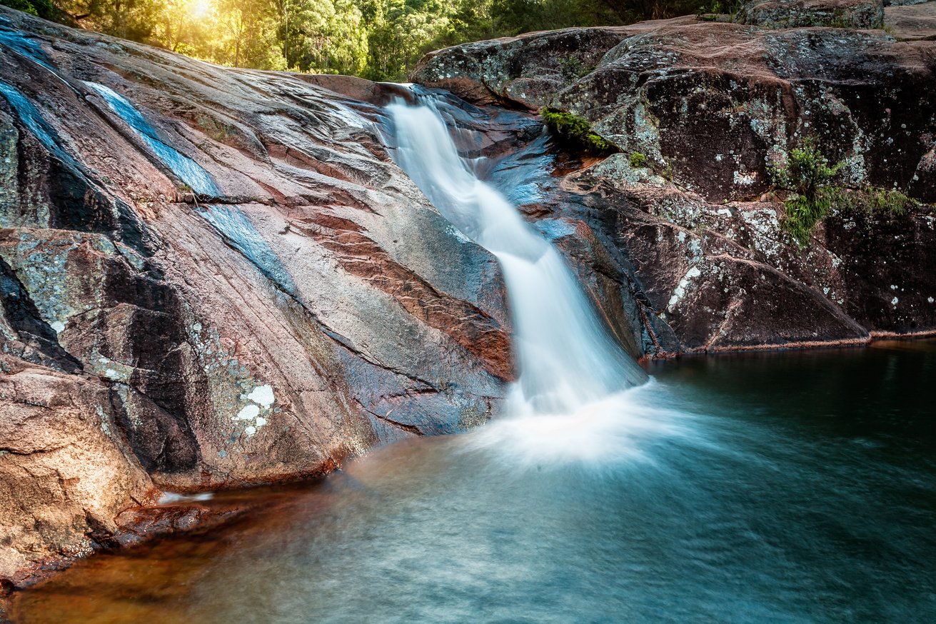 Lush Slip Slide Waterfall into Swimming Hole